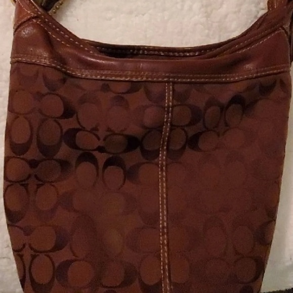 2 Coach handbags and 1Michael kors